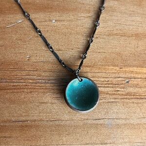 Penny pendant on copper chain